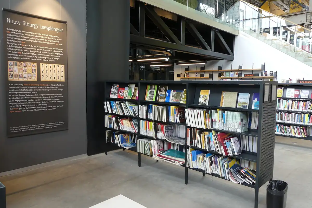 Interior of LocHal library in Tilburg showing a former locomotive hall adapted for public use