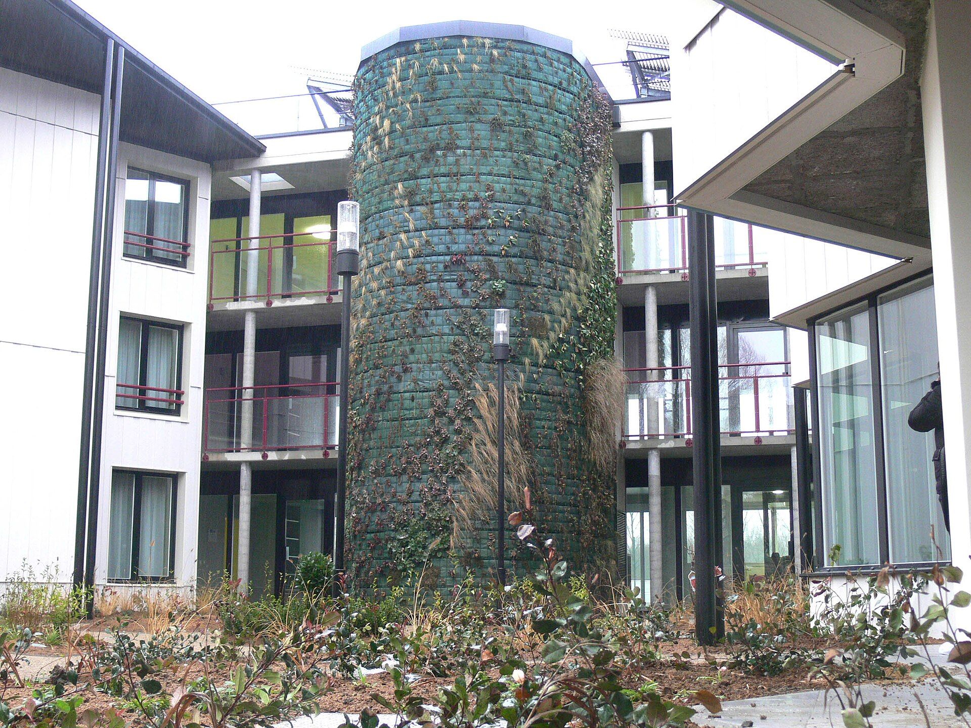 Planted cylindrical wall in the courtyard of a retirement home in Trith-Saint-Léger, France