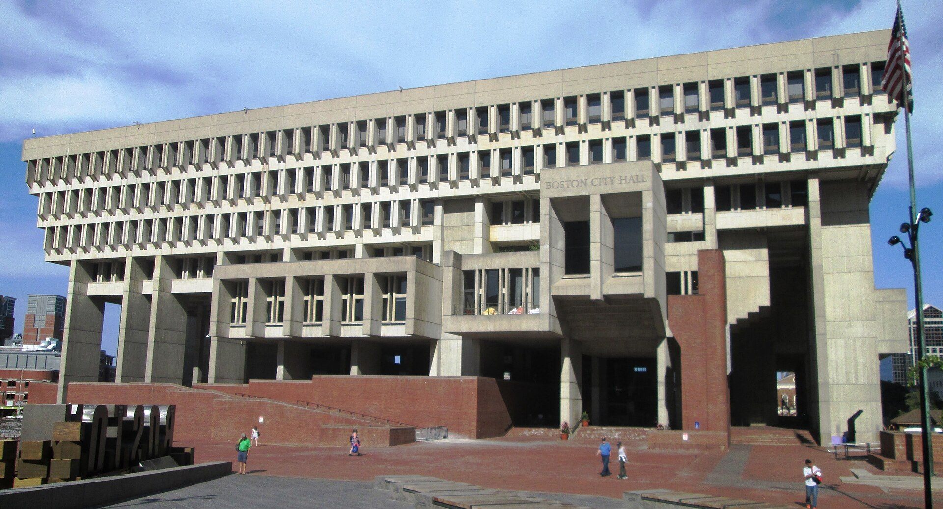 Boston City Hall showing projecting concrete volumes and deep shadows above the civic plaza