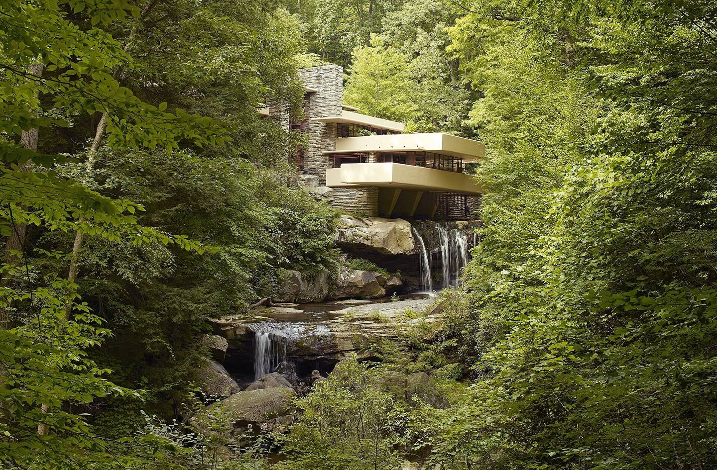 Fallingwater by Frank Lloyd Wright, its concrete terraces cantilevered over the waterfall at Bear Run, Pennsylvania