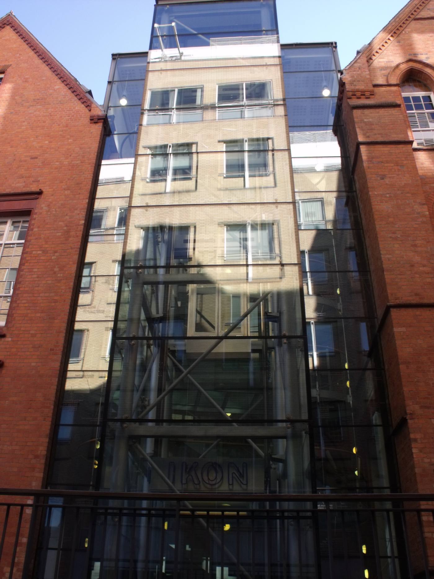 A modern glass lift shaft at the IKON Gallery in Birmingham