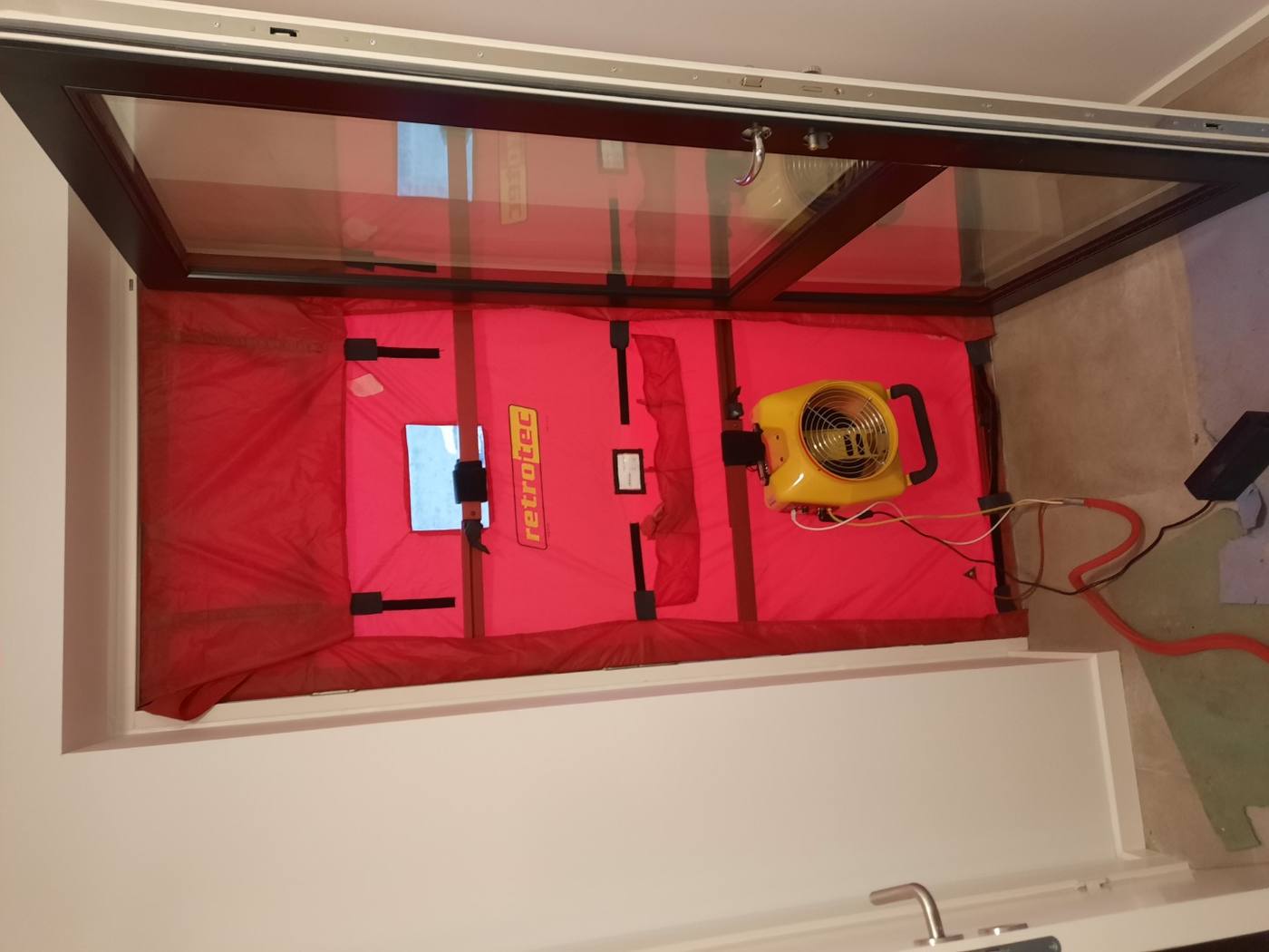 A blower-door fan installed in a doorway for a pressure test