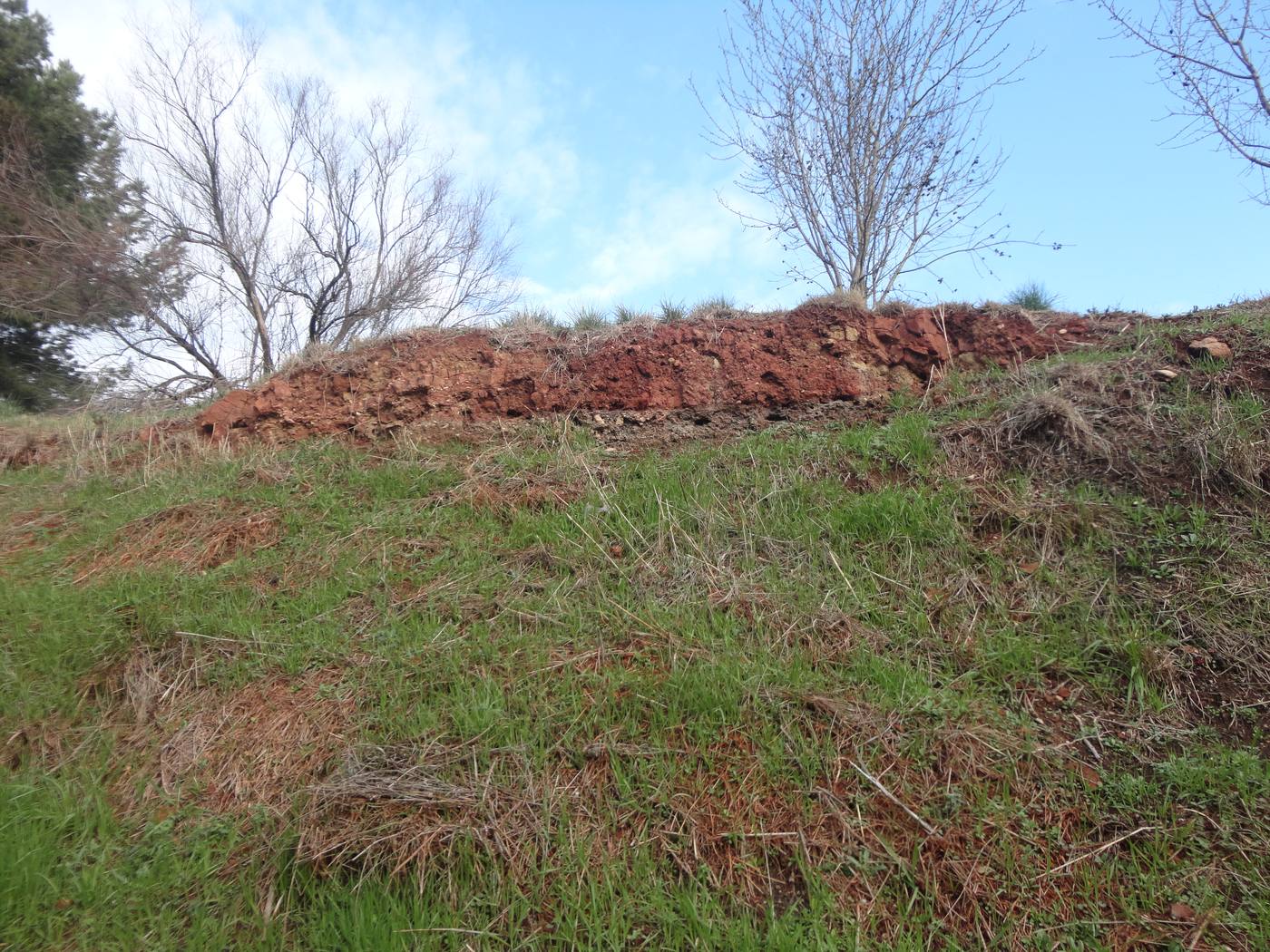 A red mud (bauxite residue) bank — the aluminium-production waste material
