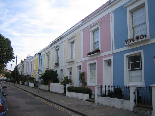 Pastel-rendered terraced houses on Leverton Street, Kentish Town, in north London