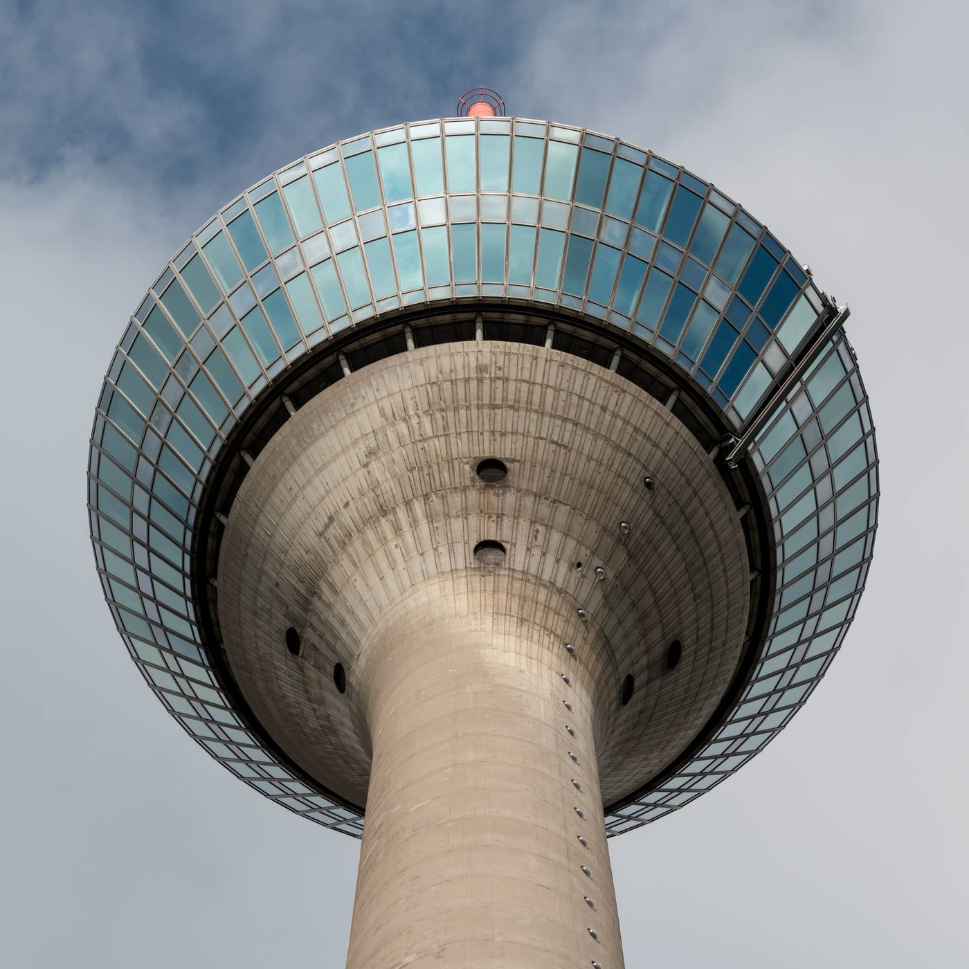 The Rheinturm television tower in Düsseldorf, seen from below against the sky