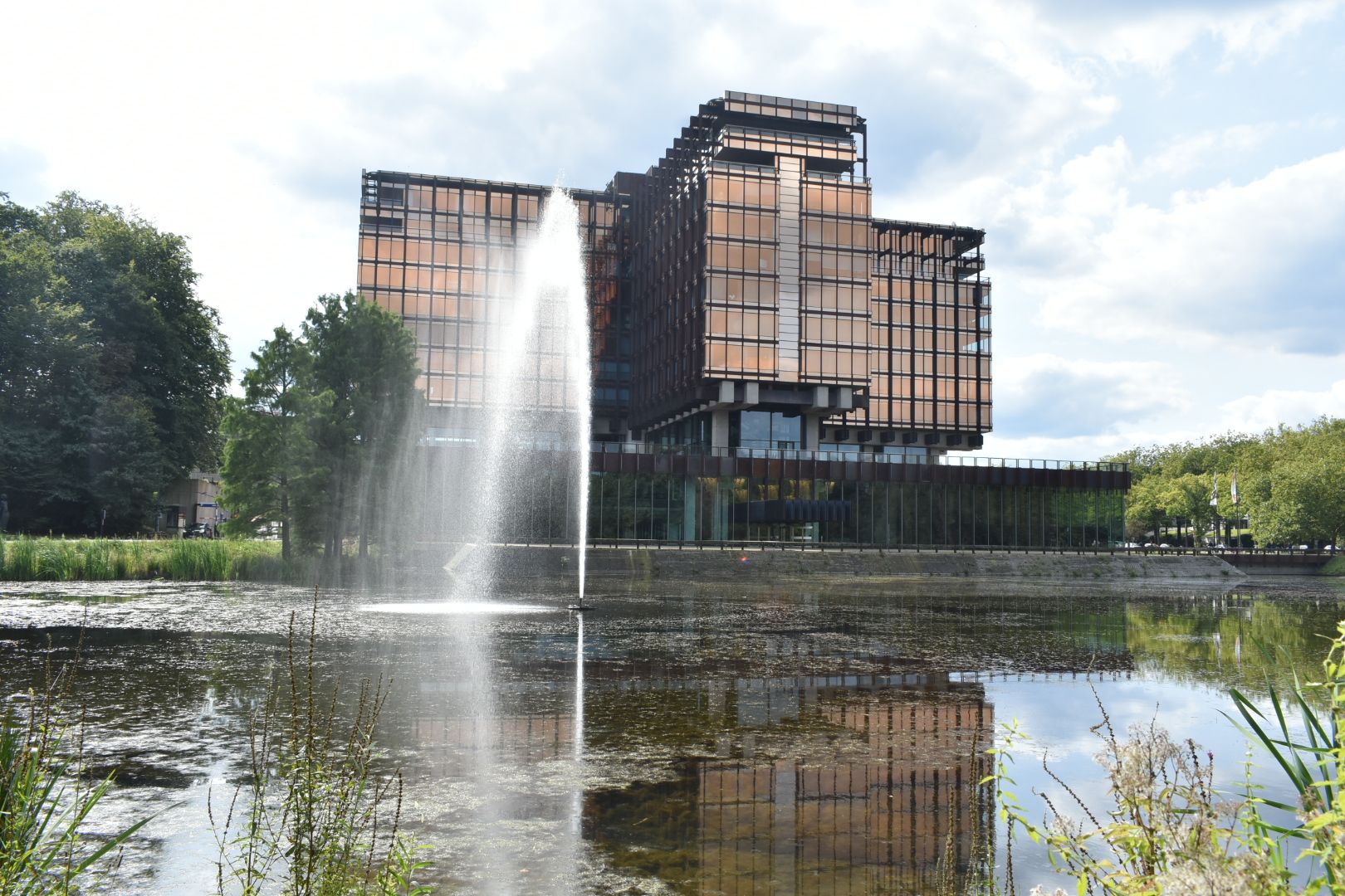 Royale Belge building in Brussels reflected in its pond in a 2024 photograph