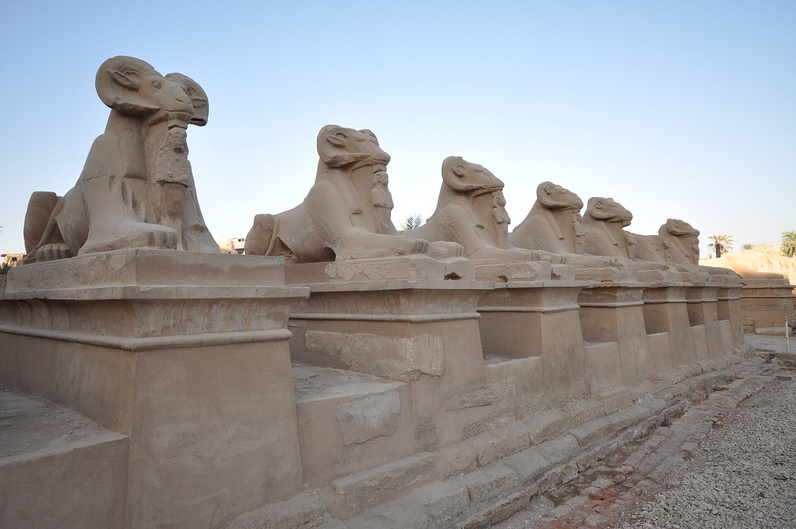The avenue of ram-headed sphinxes before the first pylon of Karnak: the processional approach to the temple of Amun