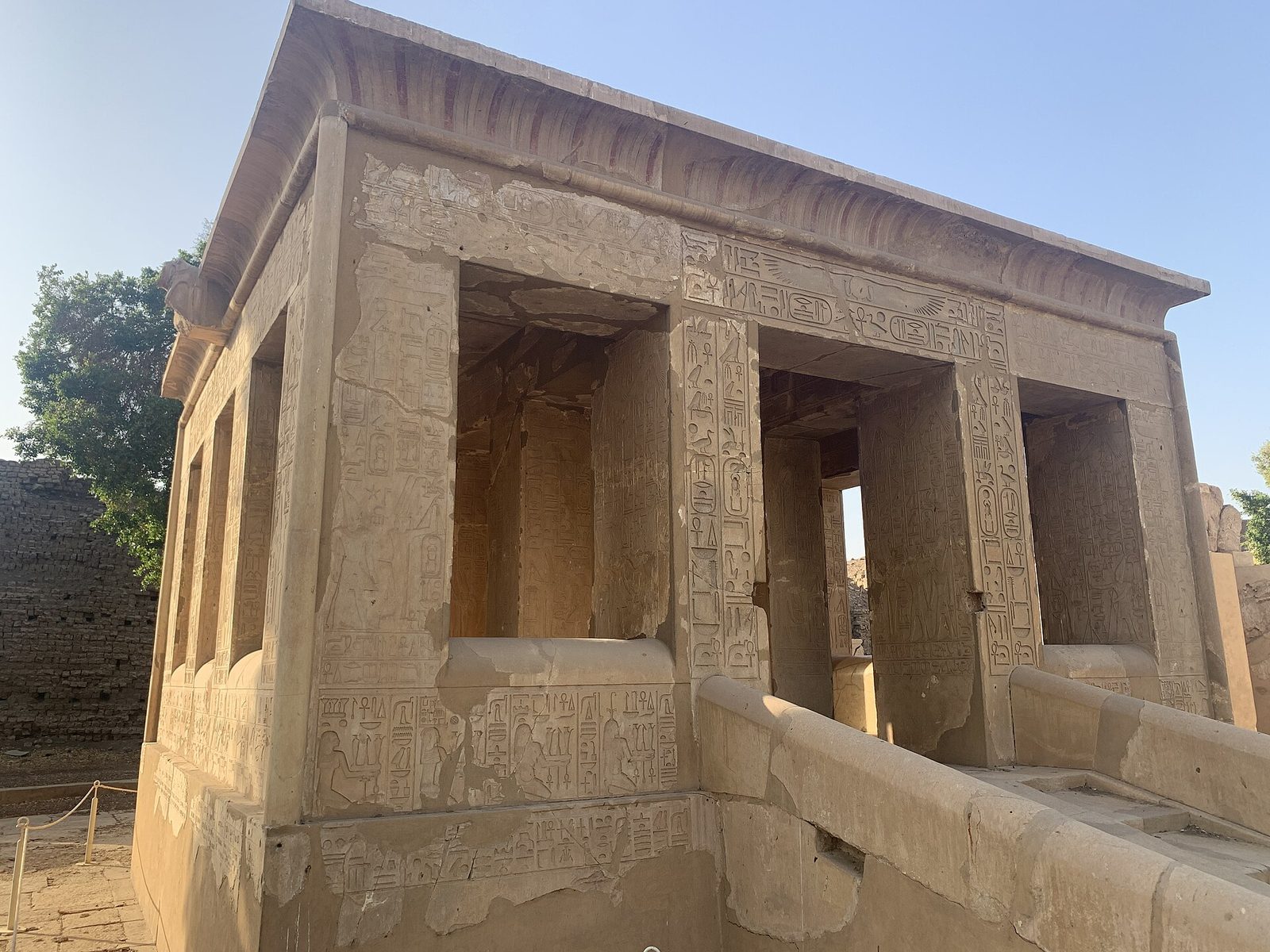 The White Chapel of Senusret I at Karnak, reassembled in the Open Air Museum: pale limestone walls and pillars carved with fine relief