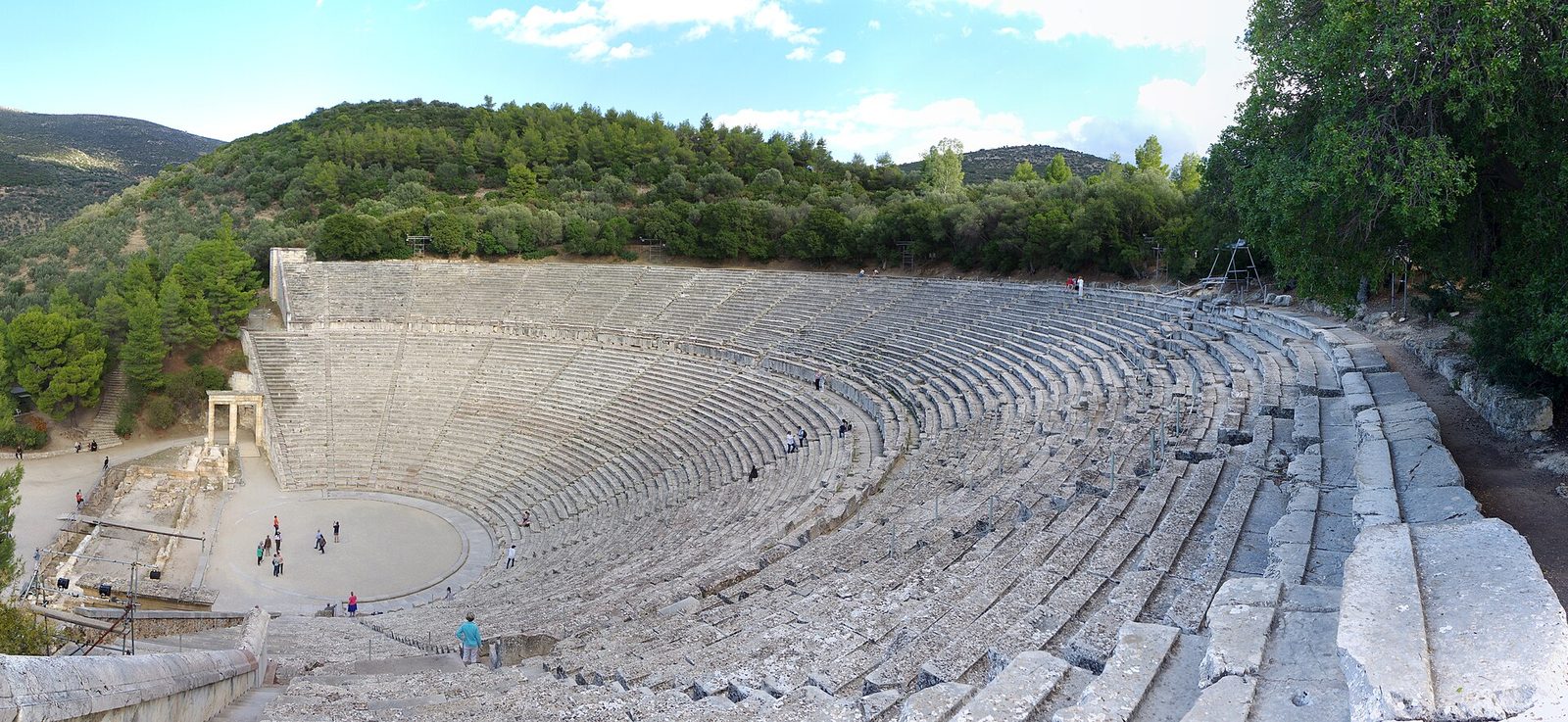 The theatre at Epidaurus: the great cavea of limestone seats curving above the orchestra