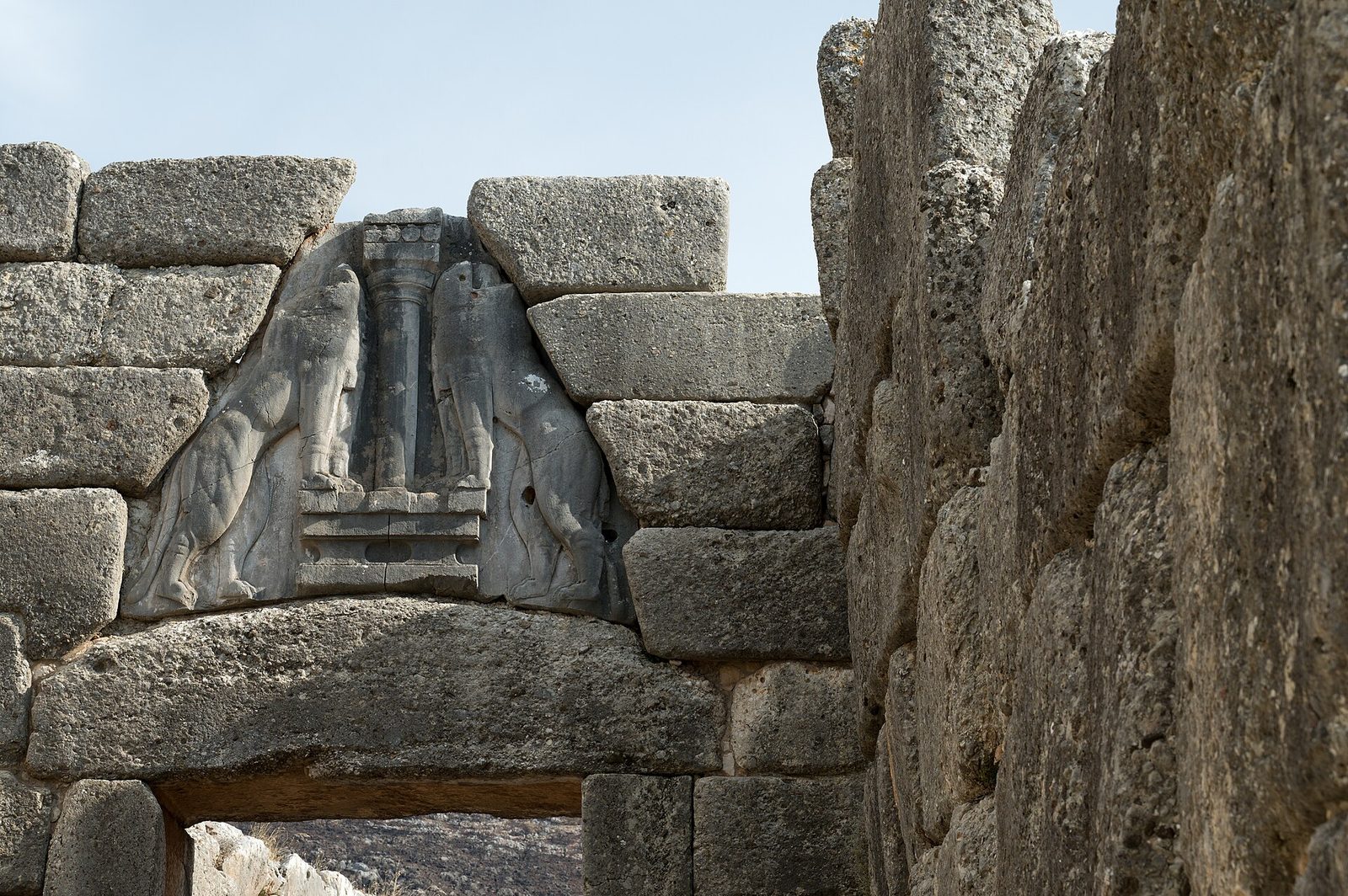 The Lion Gate at Mycenae: two lions flanking a column above the great lintel