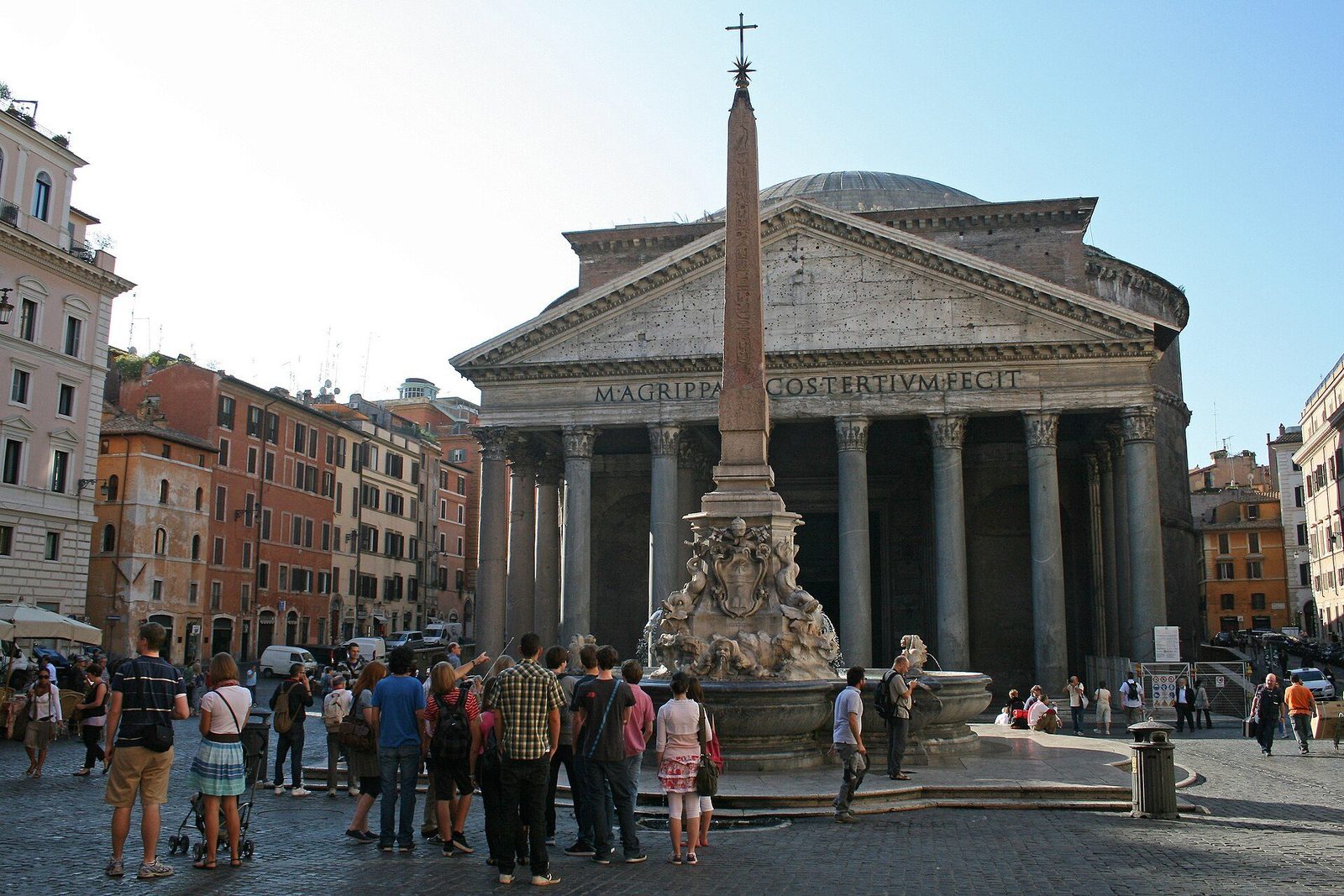 The Pantheon from the Piazza della Rotonda in Rome: the columned portico and pediment seen behind the piazza's fountain and Egyptian obelisk