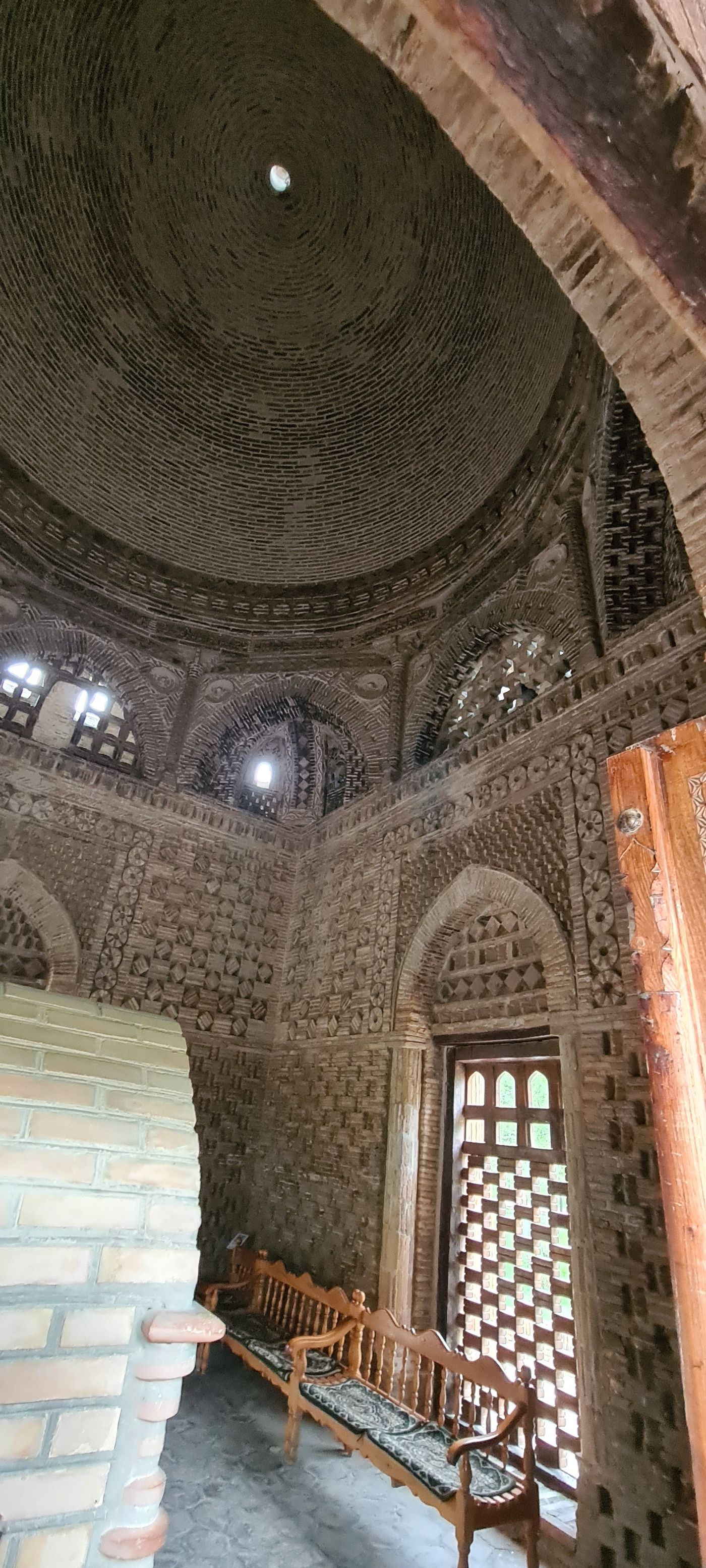 Inside the Samanid Mausoleum in Bukhara, where squinches turn the square chamber to the dome