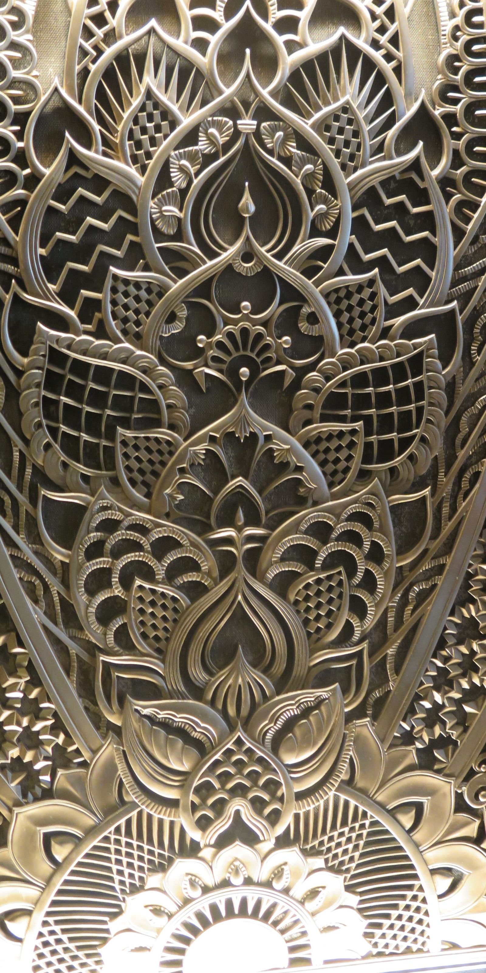 Stylised metal grillwork from the Chanin Building in New York, its plant forms straightened into geometry
