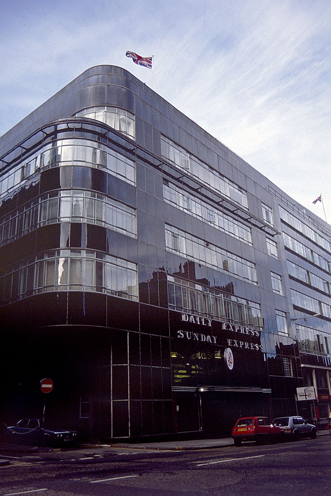The Daily Express Building on Fleet Street in London, black Vitrolite glass curving round its corner