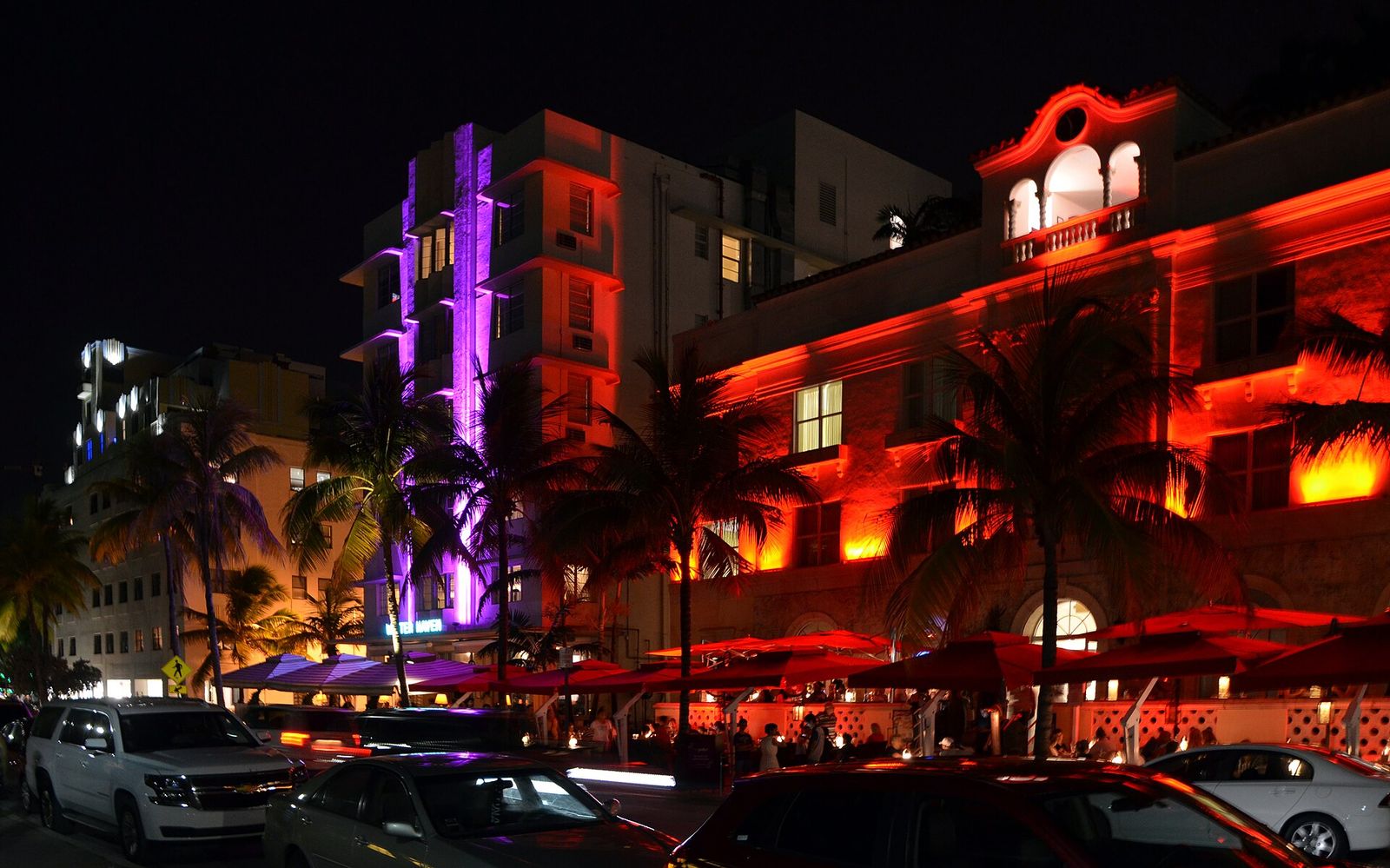 Art Deco hotels on Ocean Drive, Miami Beach, lit in neon at night