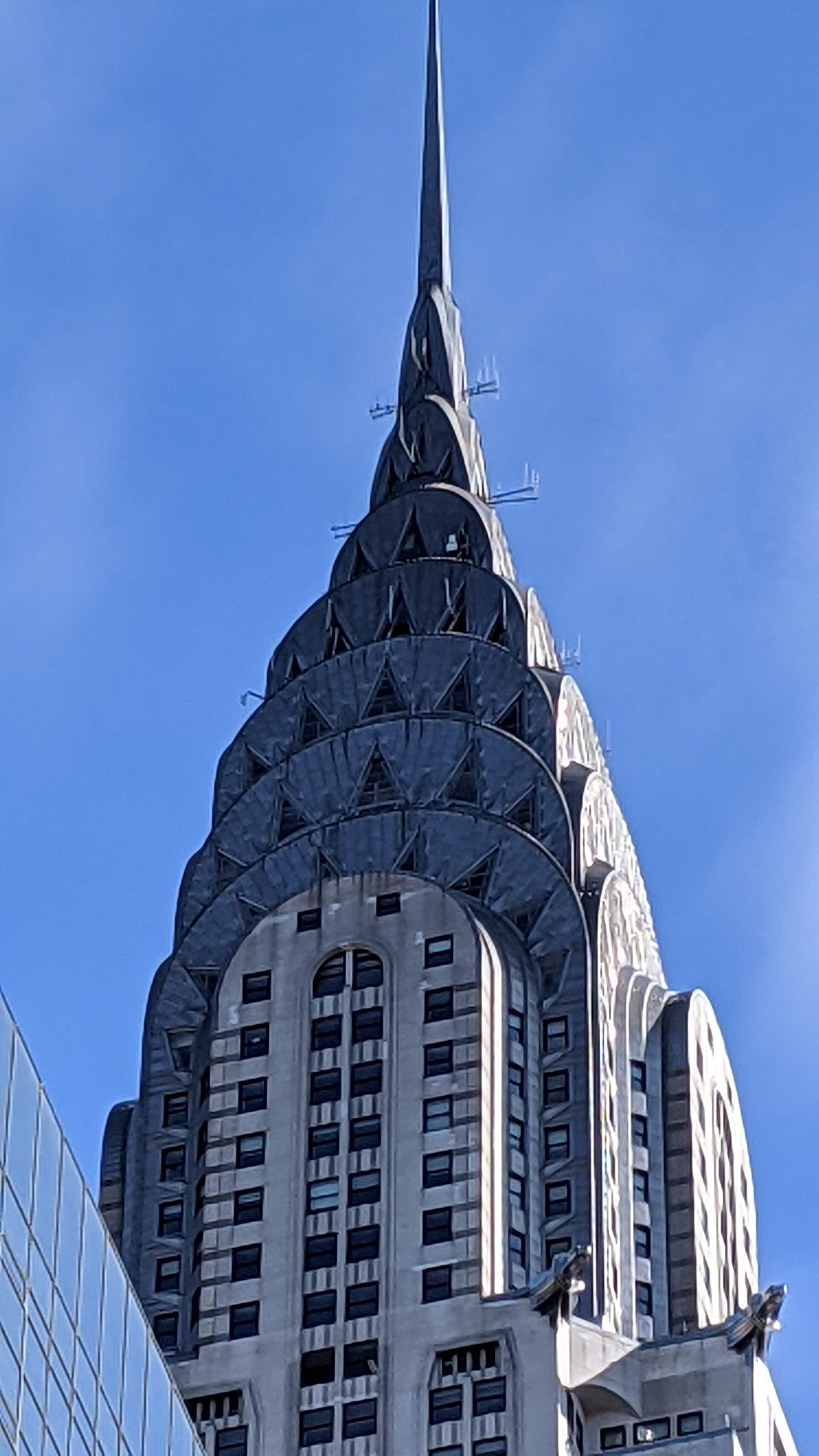 Close view of the Chrysler Building's terraced stainless-steel crown and needle spire