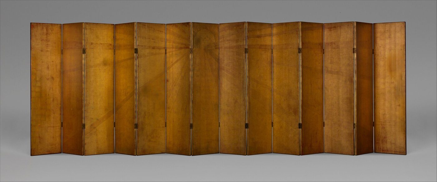 Jean Dunand's Sunrise-Sunset folding screen in warm brown lacquer at the Metropolitan Museum