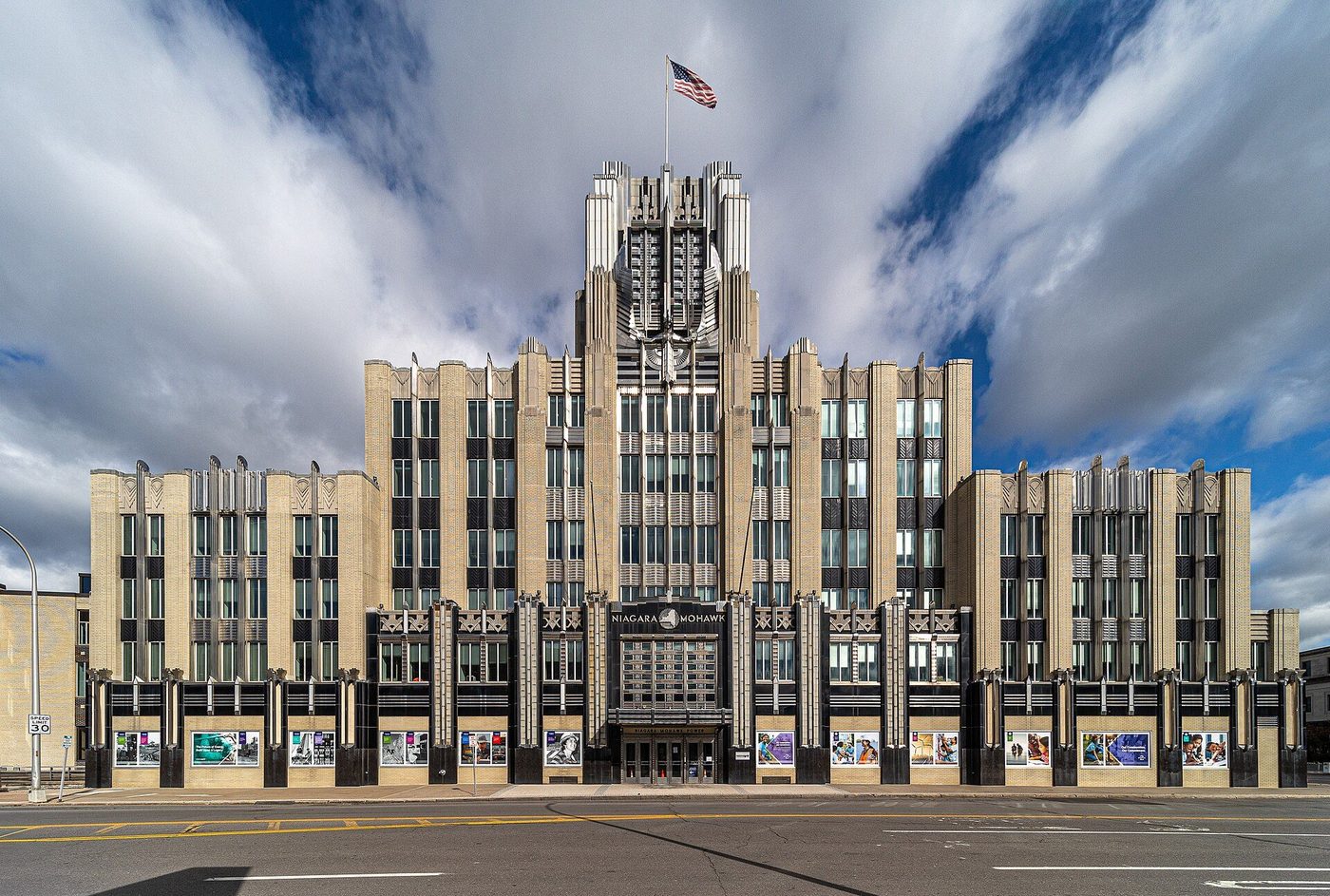 The Niagara Mohawk Building in Syracuse, a stepped golden tower crowned by the Spirit of Light