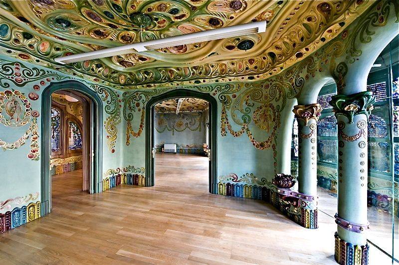 Columns with floral capitals in the interior of Casa Comalat, Barcelona