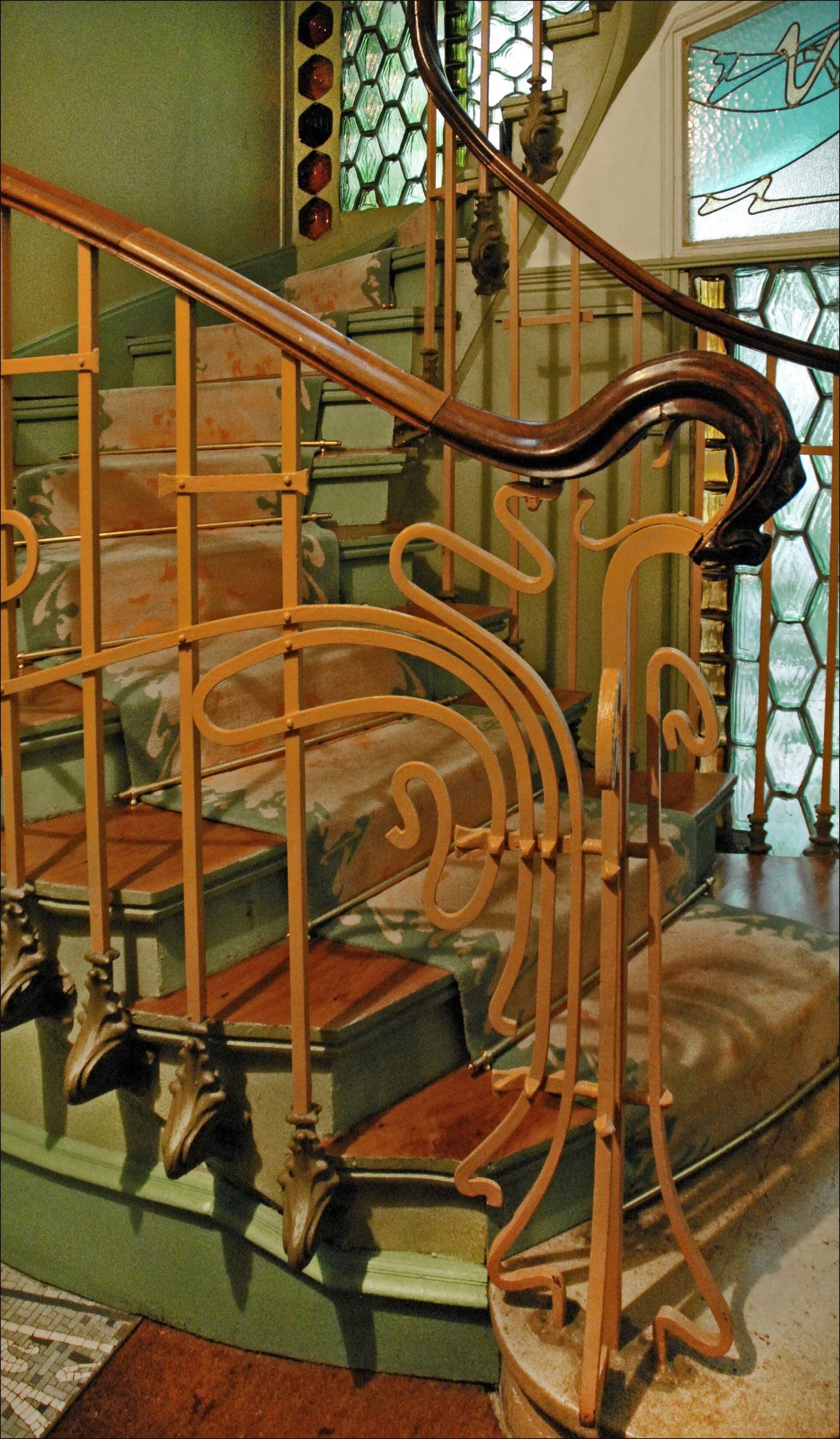 Whiplash-line iron railing detail