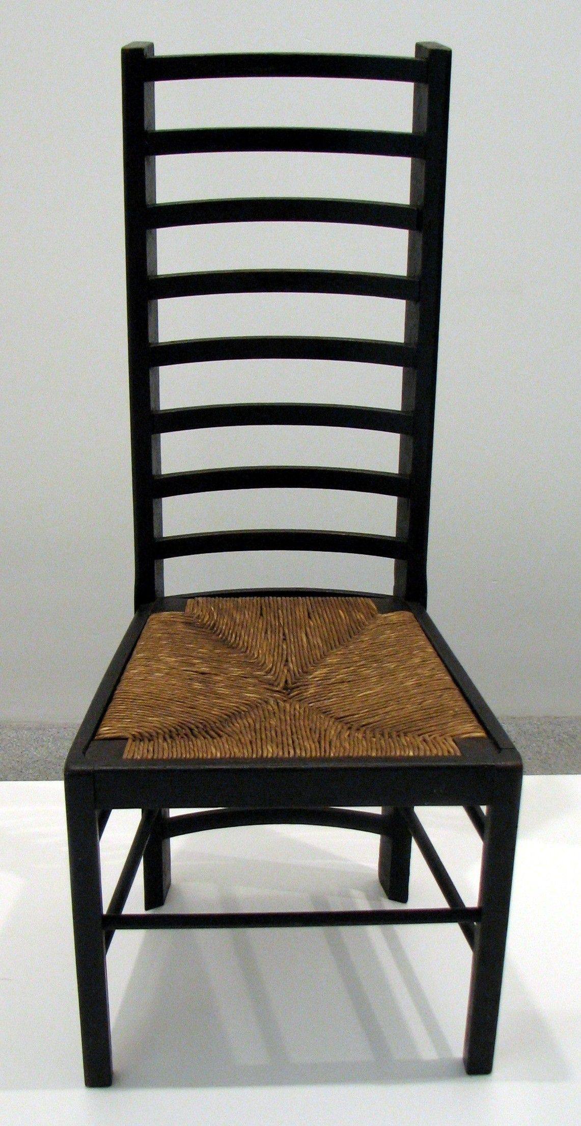 A ladder-back chair designed by Charles Rennie Mackintosh