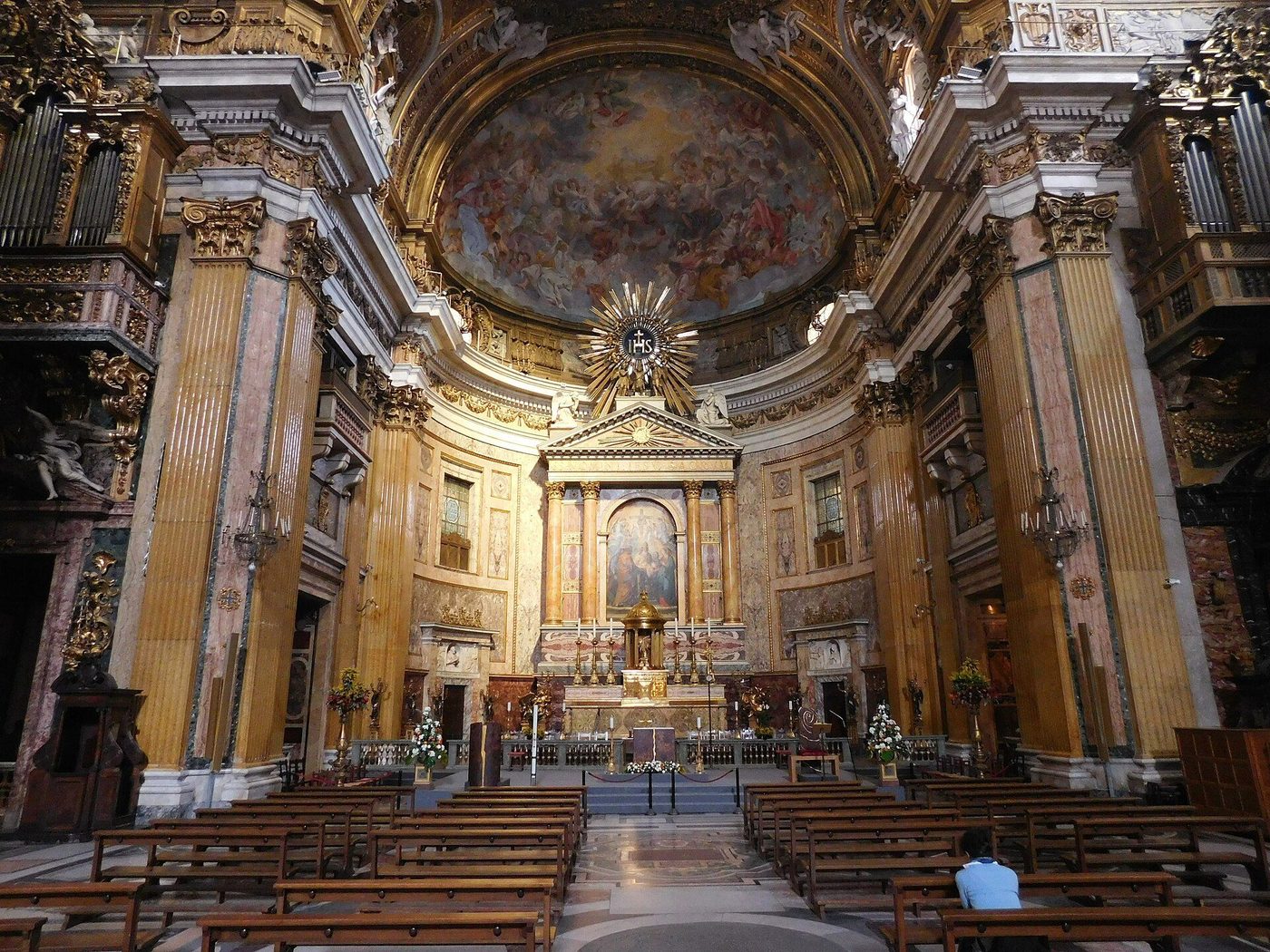 The nave of Il Gesù, Rome — the wide preaching space Vignola gave the Jesuits, aimed at its gilded altar
