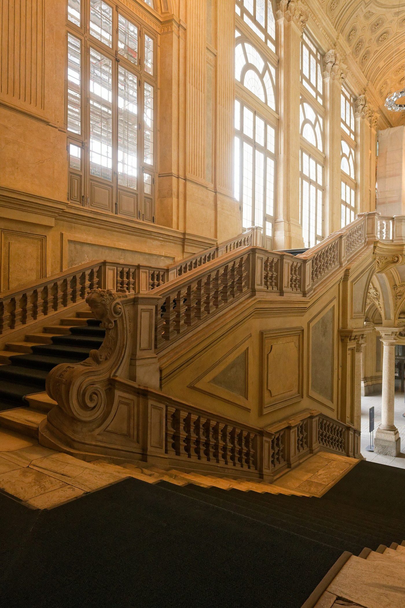 Juvarra's staircase hall at Palazzo Madama, Turin — a double stair washed in light