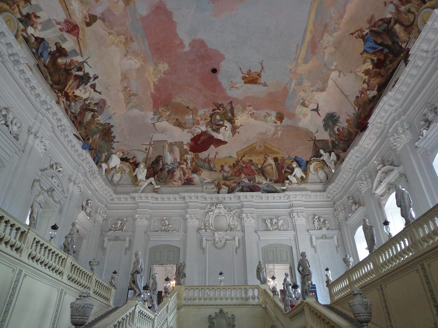 The staircase of the Würzburg Residenz — Neumann's unsupported vault beneath Tiepolo's ceiling of the Four Continents
