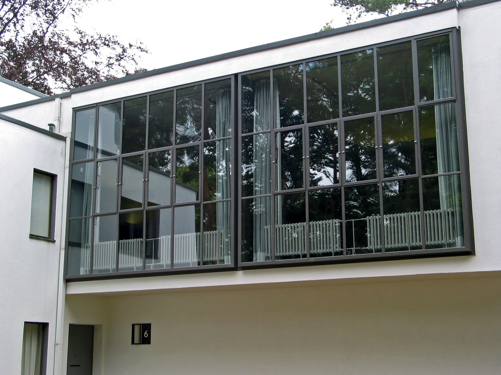A continuous strip window running horizontally around a building corner
