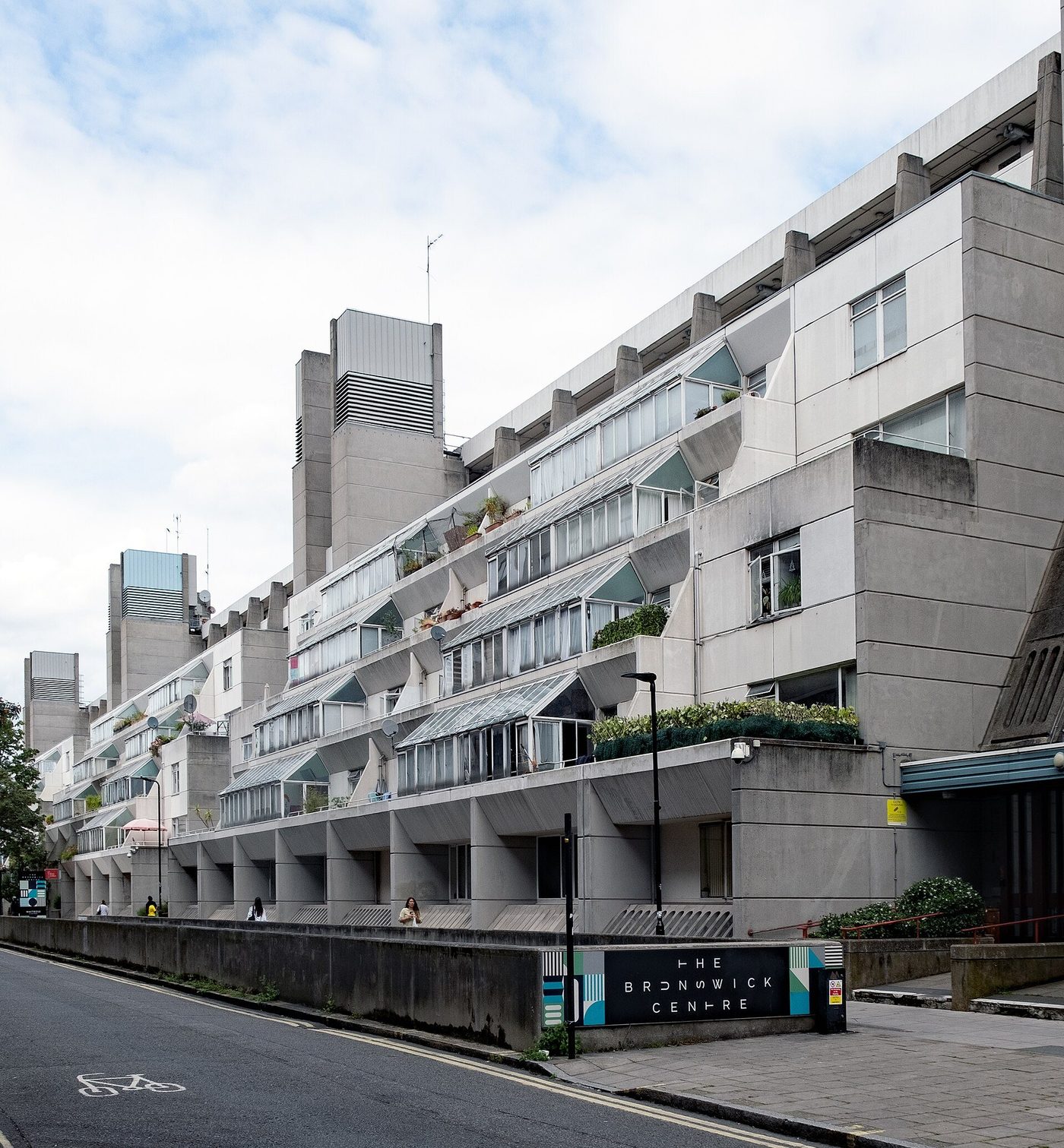 The stepped A-frame terraces of the Brunswick Centre, Bloomsbury, from Marchmont Street