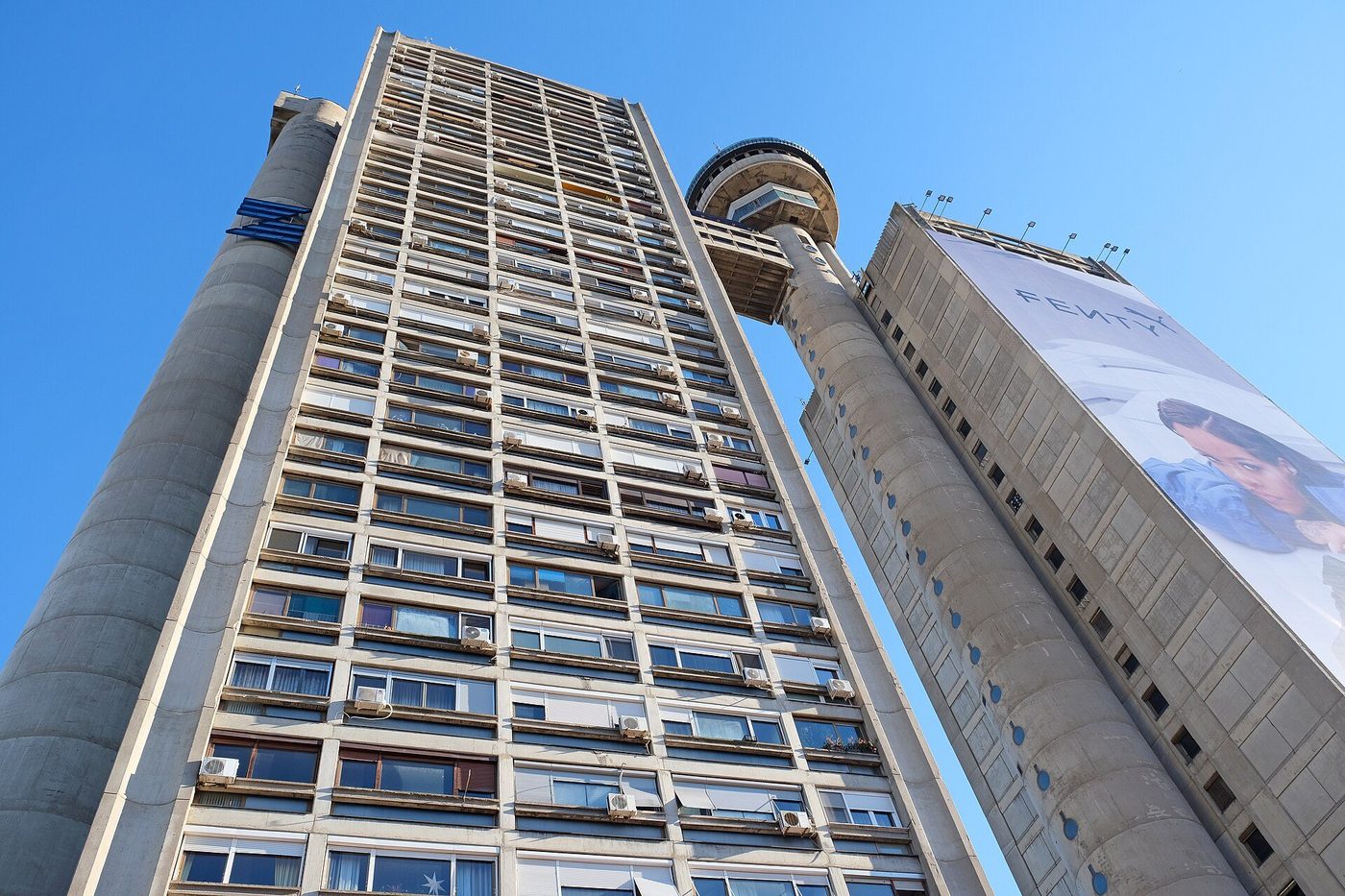 The Genex Tower, Belgrade, from below — the housing slab and its service cylinder