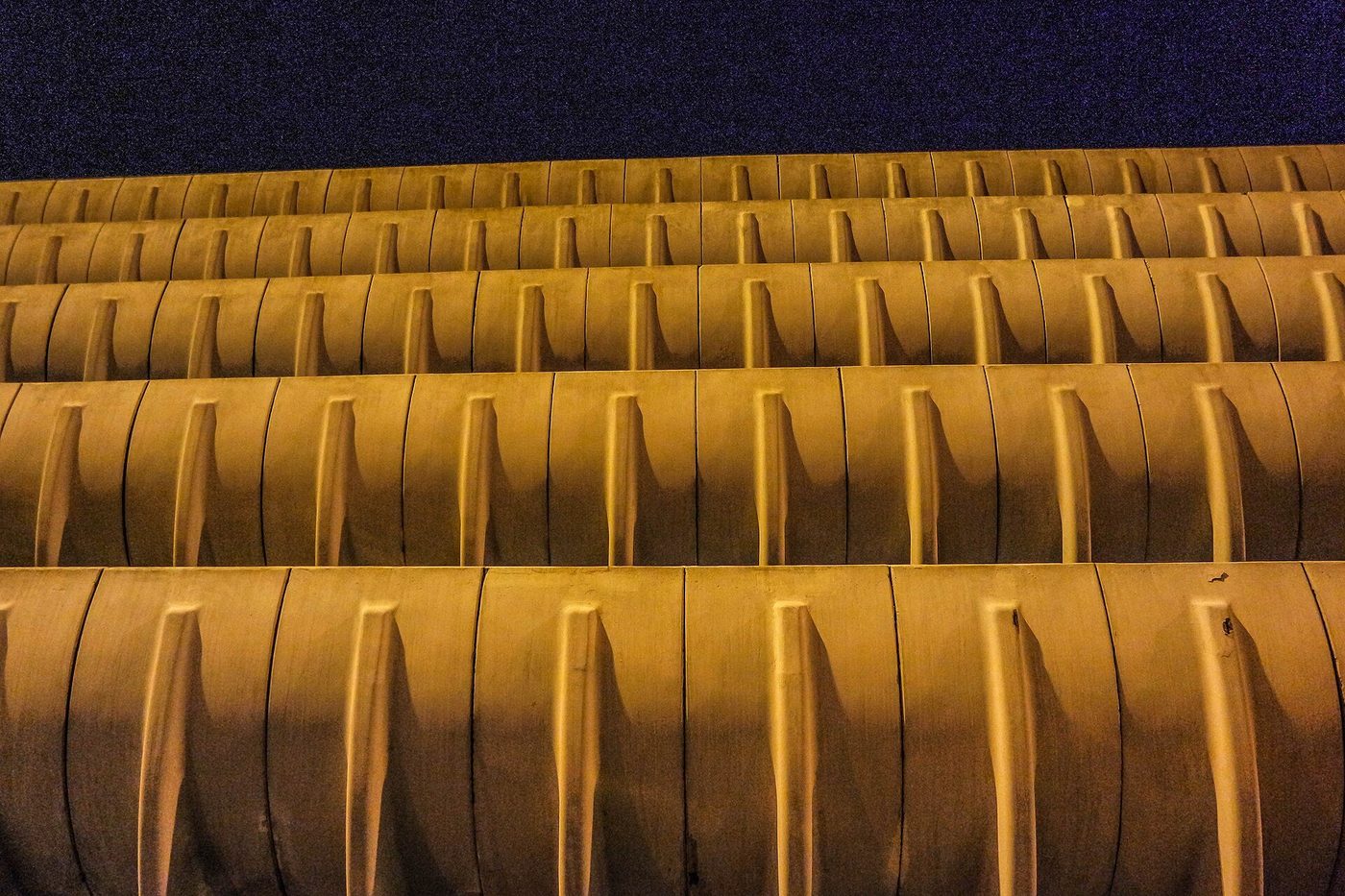 Close view of Preston Bus Station's curved concrete beams — sculpture as drainage