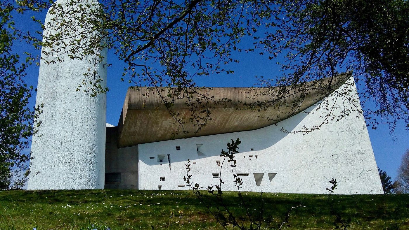 Notre-Dame du Haut, Ronchamp — the white rendered shell roof and the great tower