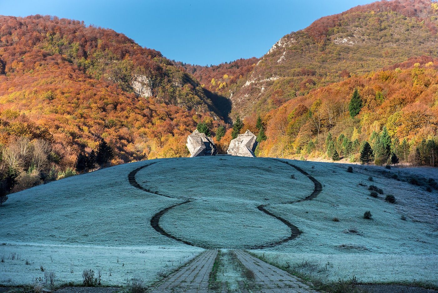 The Sutjeska memorial at Tjentište — Živković's twin concrete wings in the valley of heroes