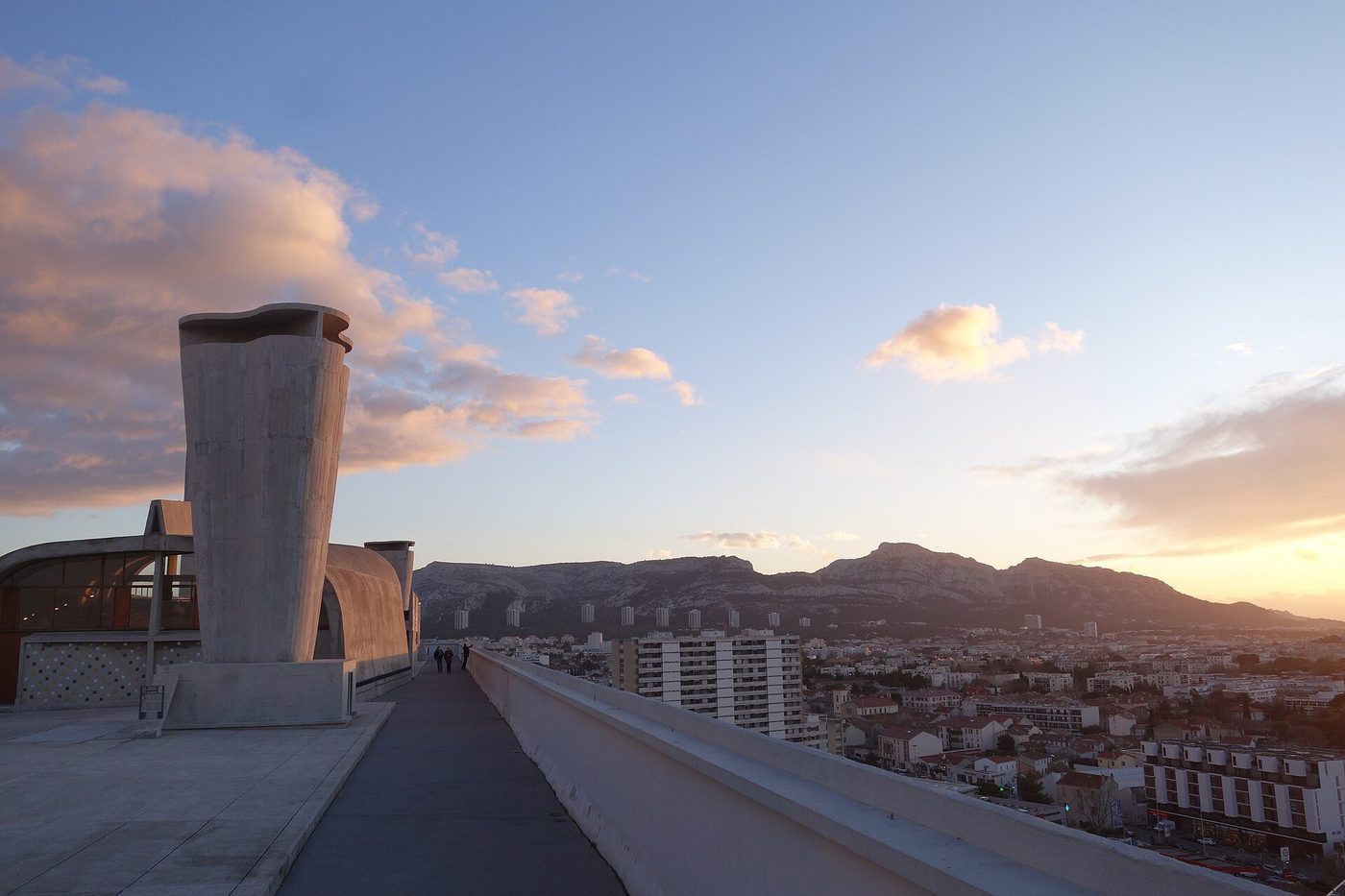 The roof terrace of the Cité radieuse, Marseille, at sunset — the ventilation stack as sculpture