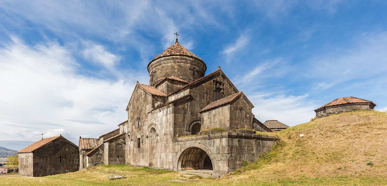 Haghpat Monastery in Armenia, its domed church on a green hill