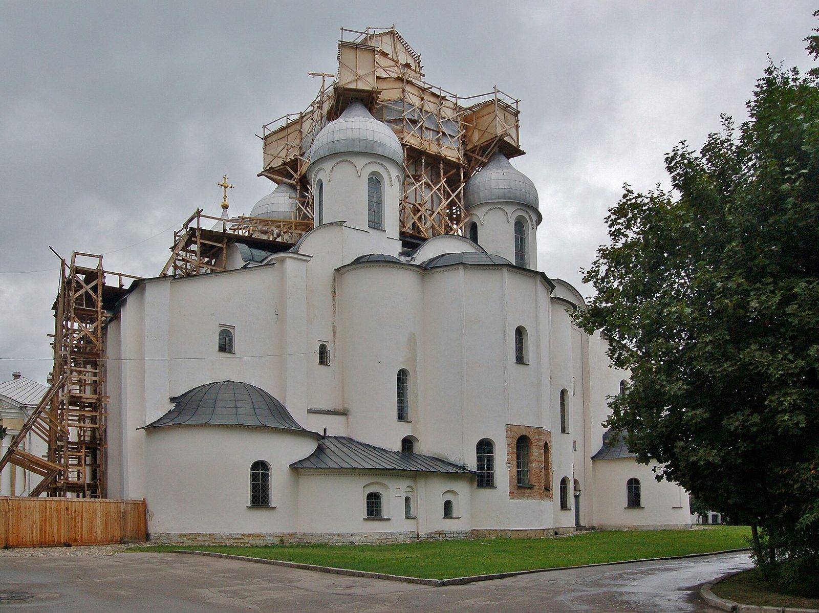 St Sophia's Cathedral in Novgorod, white walls and silver domes under restoration