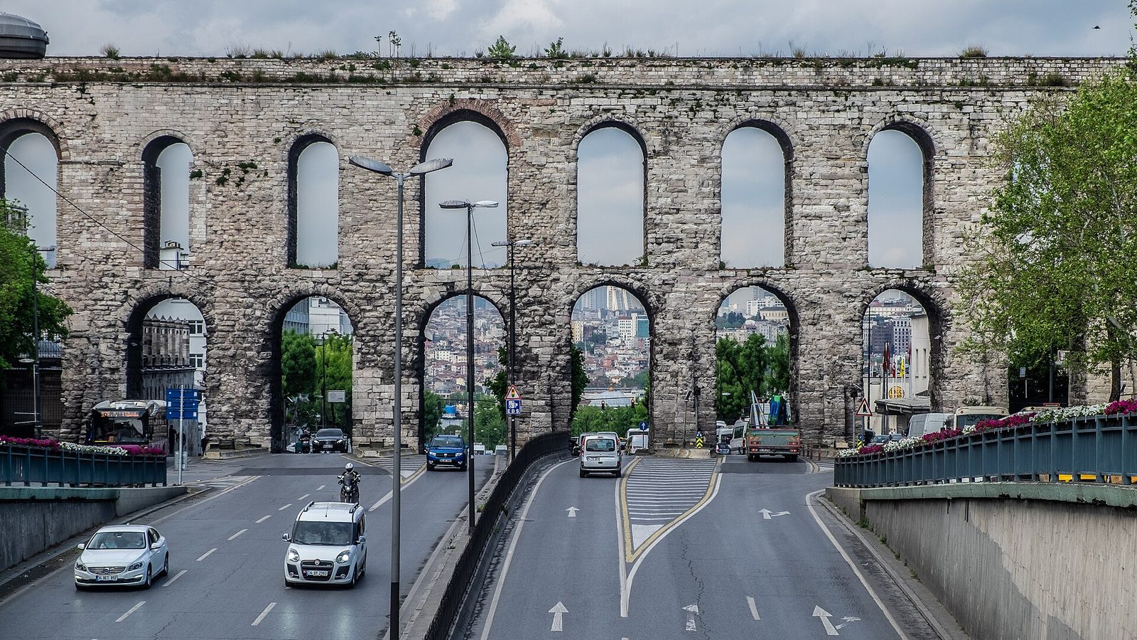 The Valens Aqueduct striding over a modern Istanbul avenue