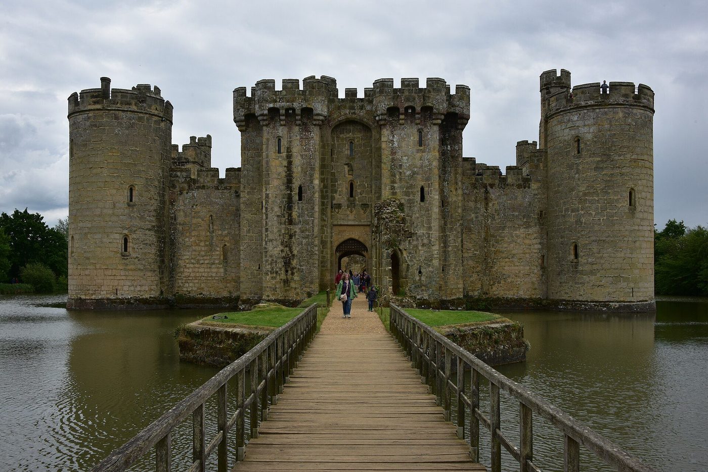 Bodiam Castle from the north: four round towers and the great gatehouse rising from the moat