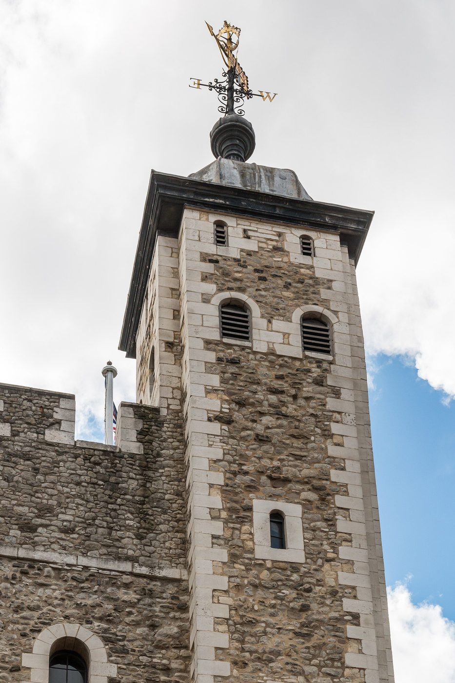 The White Tower at the Tower of London: the Norman great keep with its four turrets against the sky