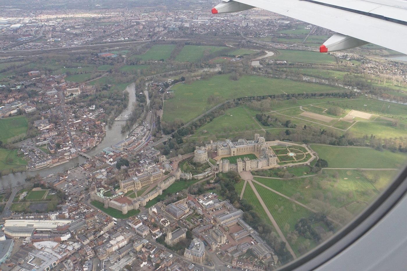 Windsor Castle from the air: the round tower and the two wards of the great royal castle above the Thames
