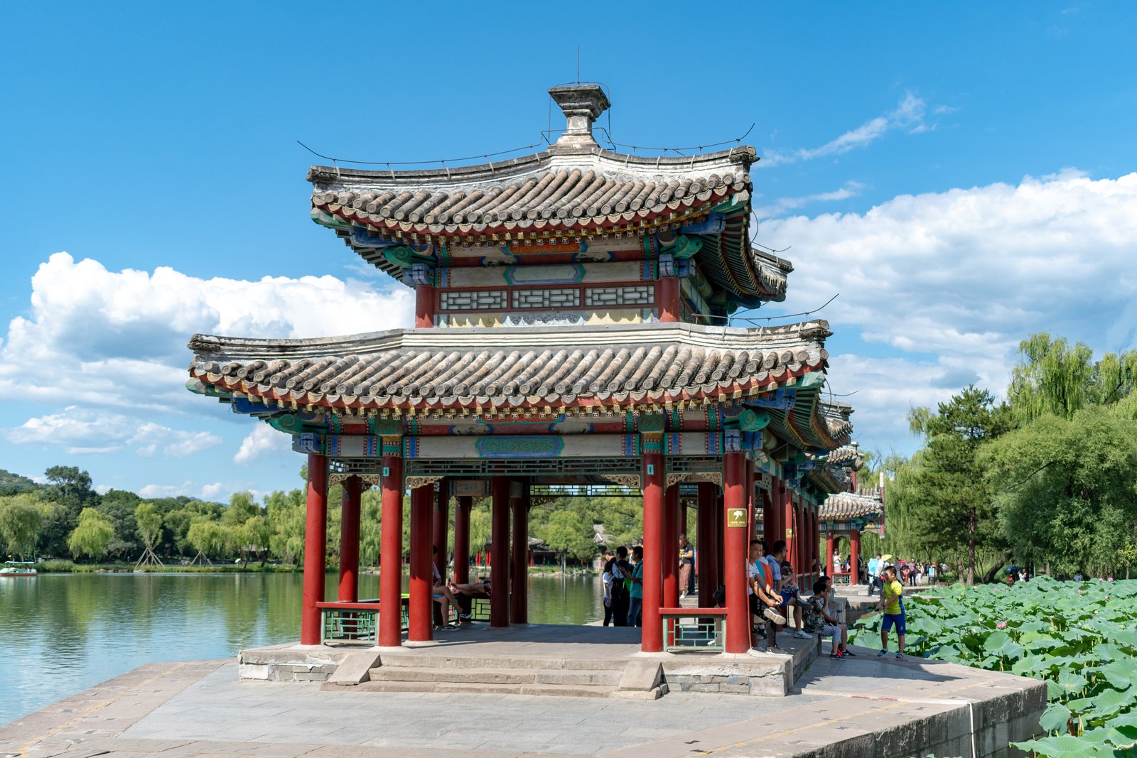 A two-storey red-pillared pavilion on the lake shore at the Chengde Mountain Resort