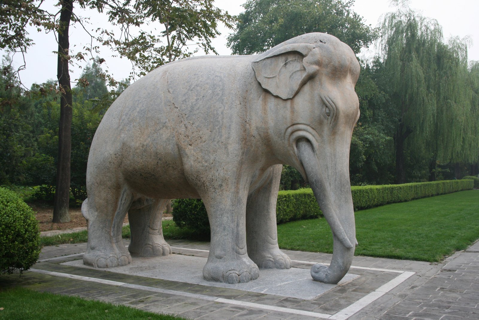 A stone elephant standing on the Sacred Way at the Ming Tombs