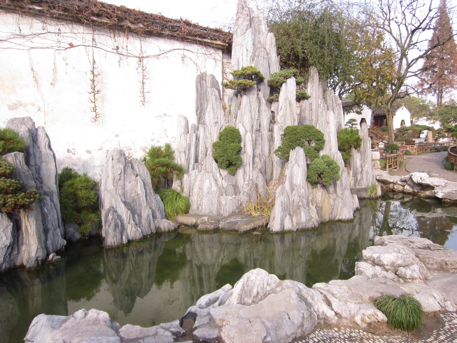 Scholar's rocks in a pond in the Lingering Garden, Suzhou