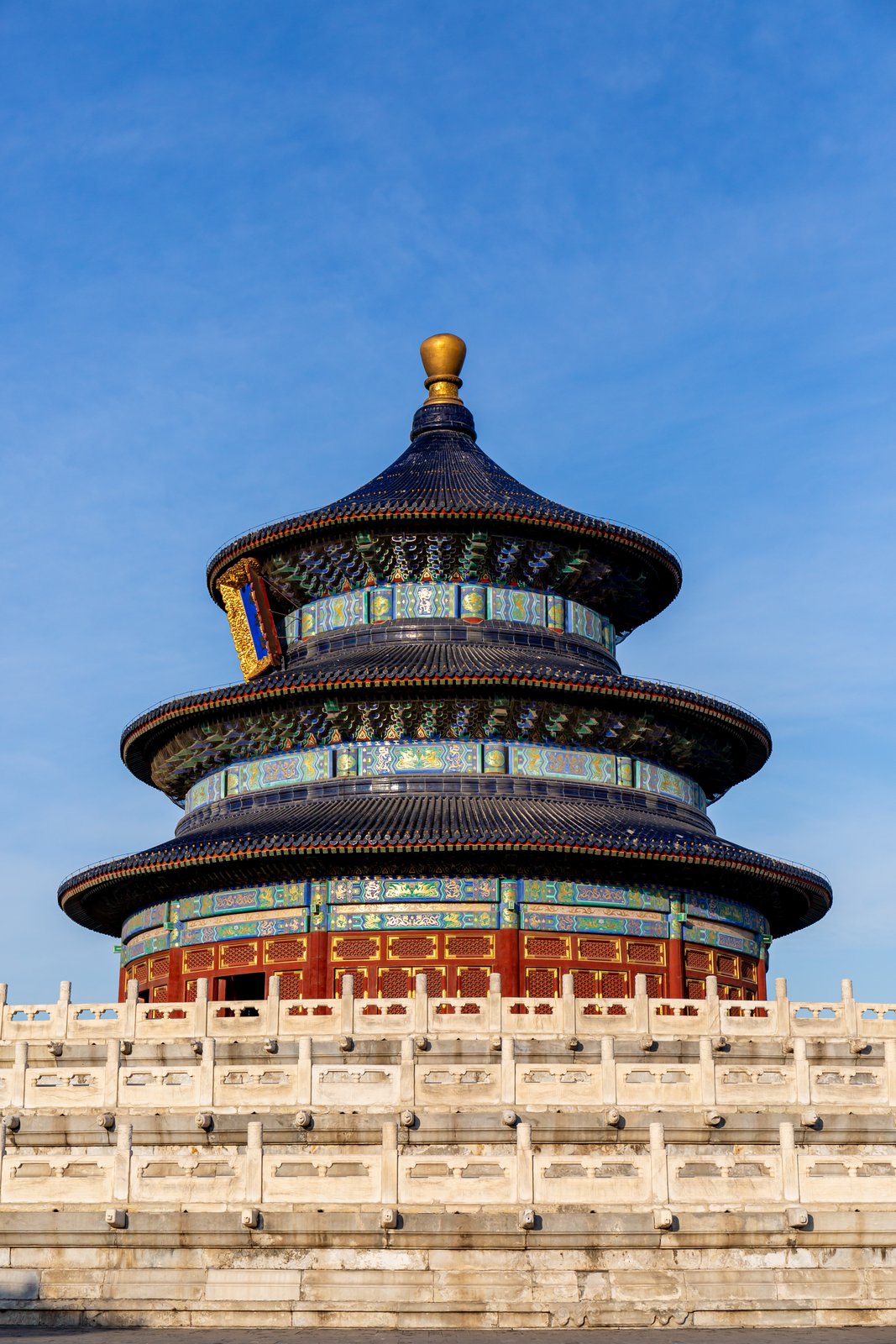The Hall of Prayer for Good Harvests at the Temple of Heaven, Beijing, its triple blue-tiled roof rising over a marble terrace