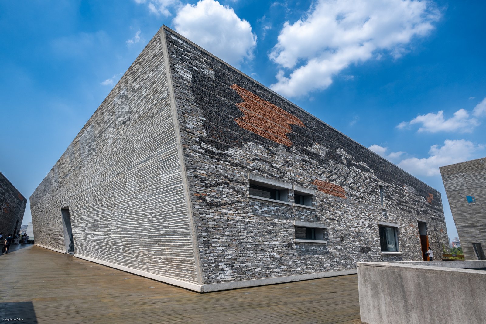 The Ningbo History Museum by Wang Shu, its angular form clad in recycled brick and tile