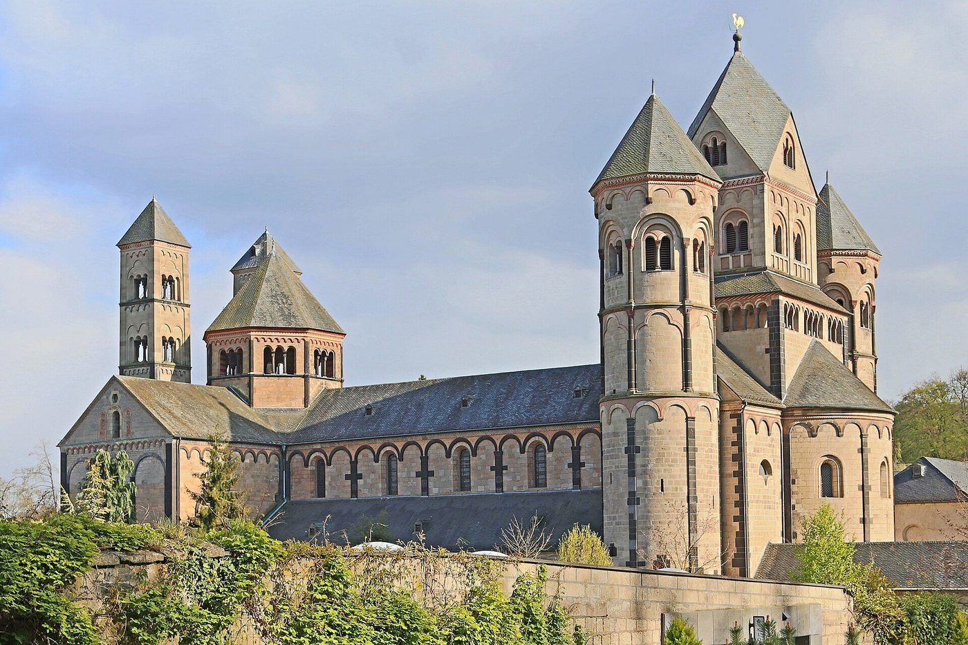 Maria Laach Abbey on its lake in the Eifel, a Rhineland Romanesque church of towers and rounded arches