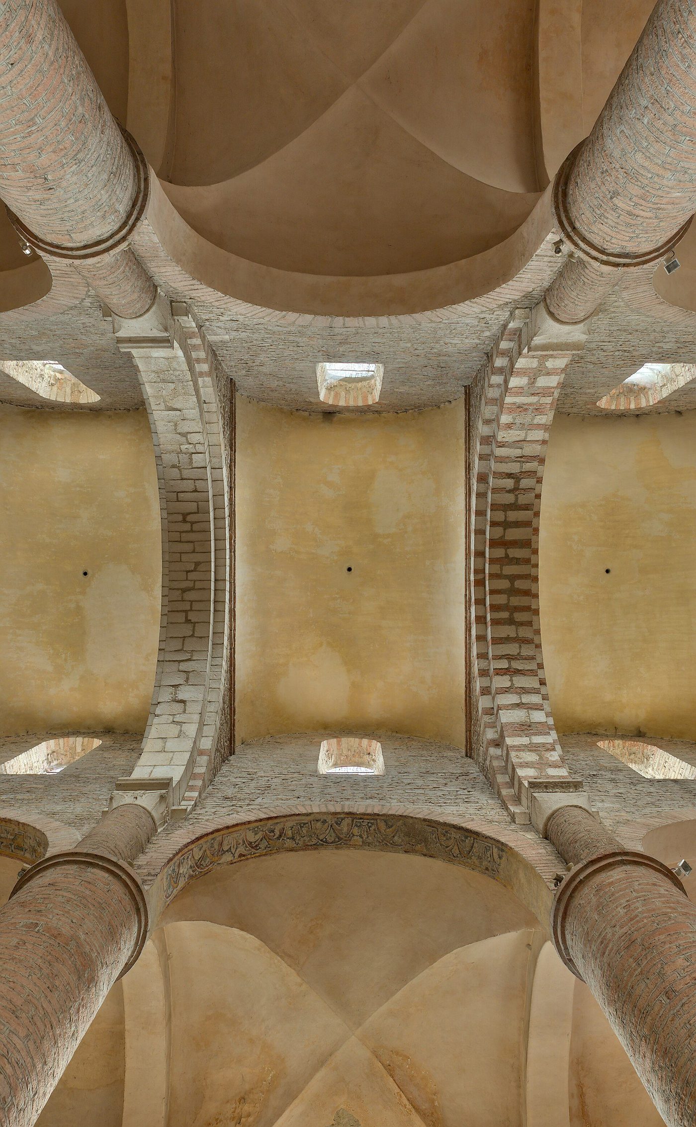 The nave vaults of Saint-Philibert at Tournus from below: transverse barrel vaults bay by bay