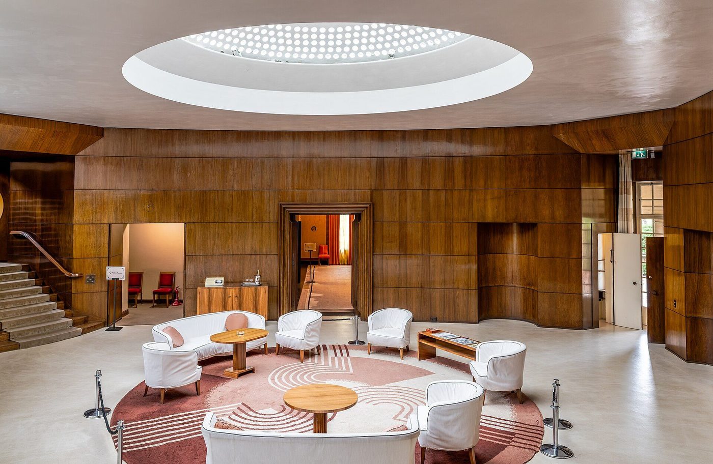 The entrance hall of Eltham Palace, London (1933–36): Art Deco panelling and a glazed dome over a circular rug