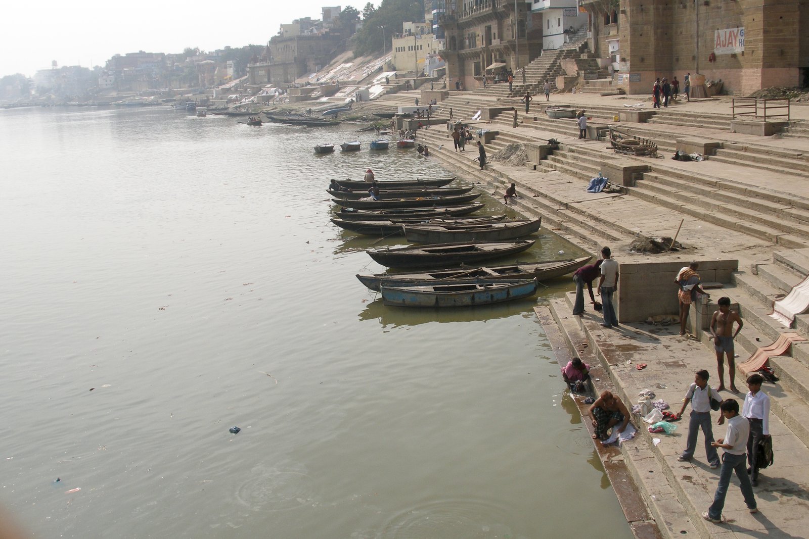 The ghats at Varanasi, stone steps descending to the river with moored boats
